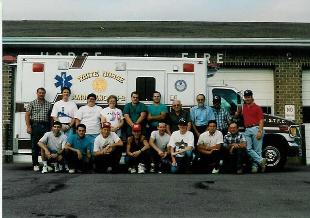 The active EMS crew in front of the then new Ambulance. L to R: J. Beyer, K. Eberly, M. Killinger, M. Lantz, M. Riehl, C. Gossert, C. Killinger, S. Simmons, R. Diem, Jr., H. Benner, L. Kurtz, R. Parmer, C. Eno, E. Riehl, A. Stoltzfus, J. Sheaffer, Jr., M. Beyer, R. Gossert... 1993